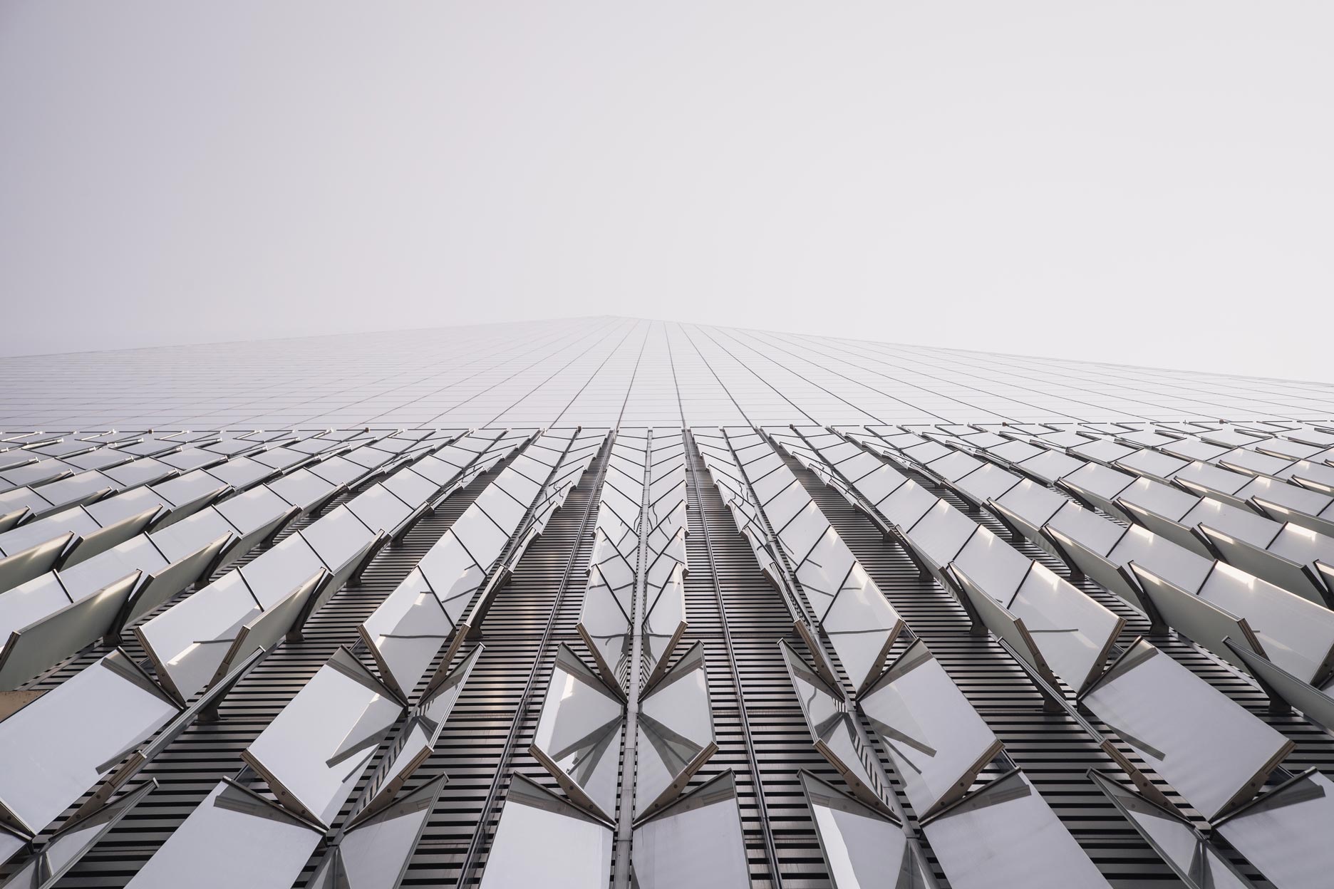 Modern architectural facade with repeating glass panels