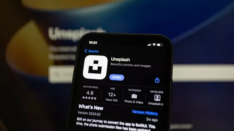 Smartphone with the logo of the unsplash app