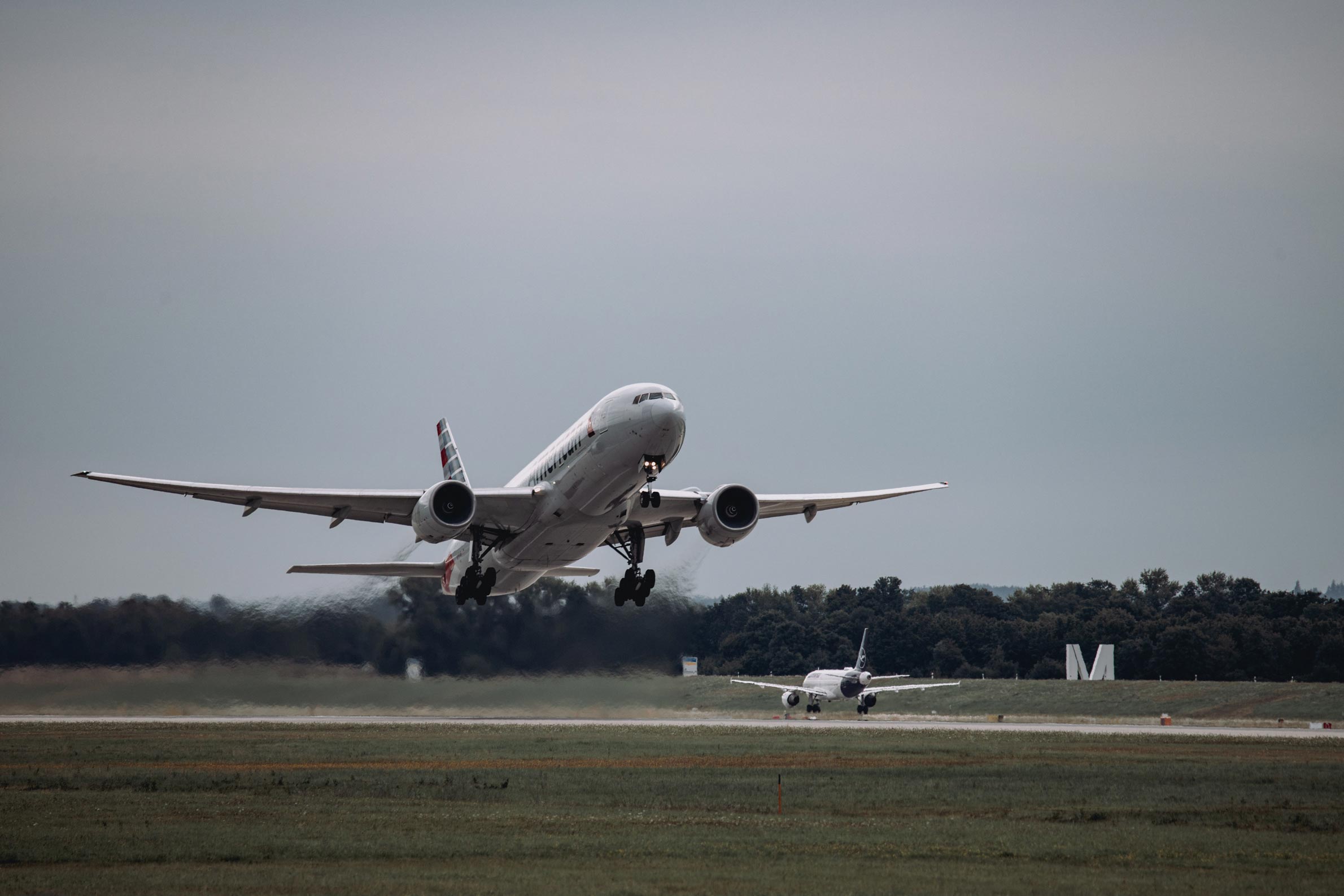 American Airlines Boeing taking off at Munich Airport